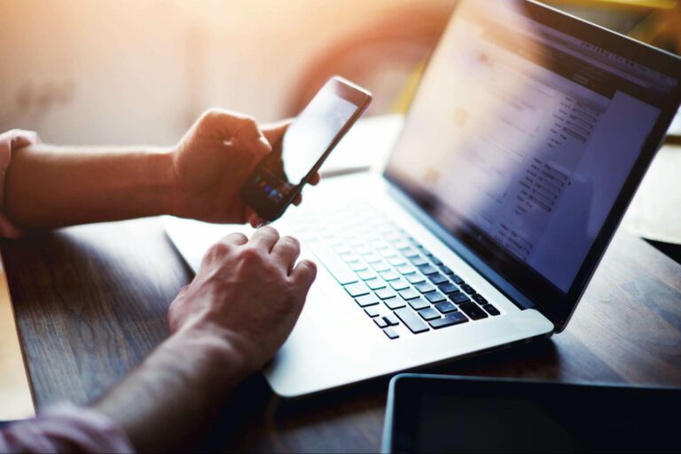 why you should build an email list | person on phone and computer