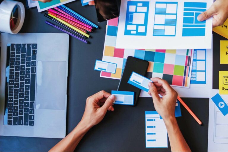 A designer compares colors and templates for a website