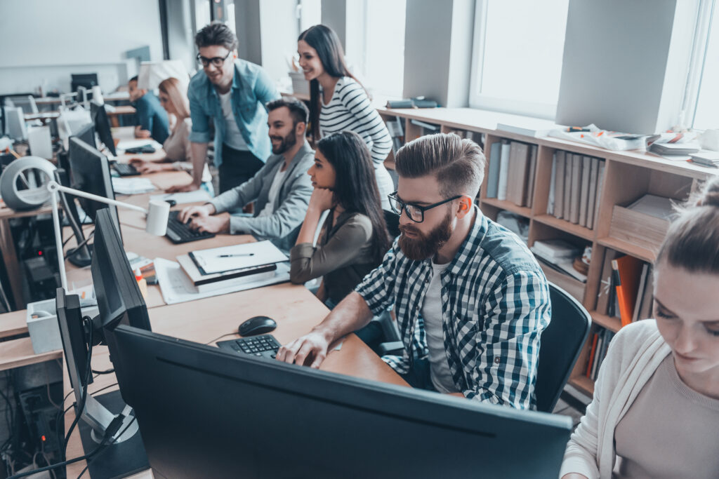 A group of people working in an office 