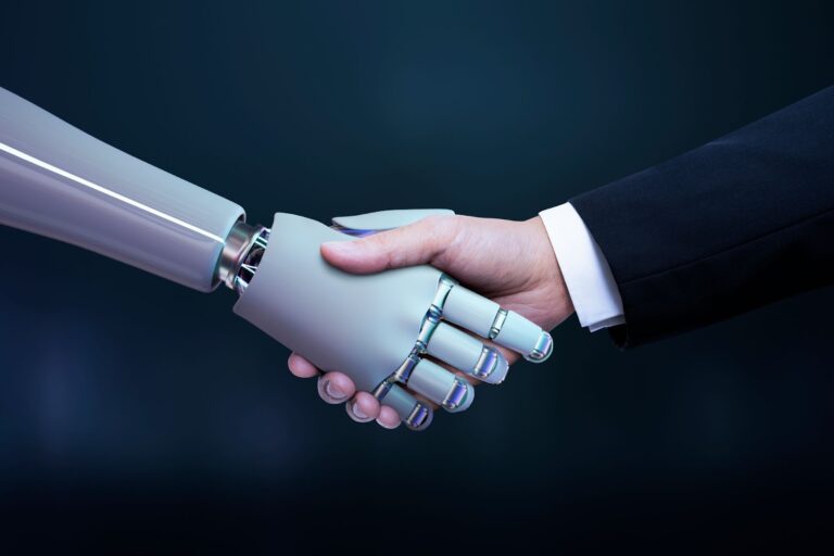 A digital rendering of a robotic hand shaking a human hand.